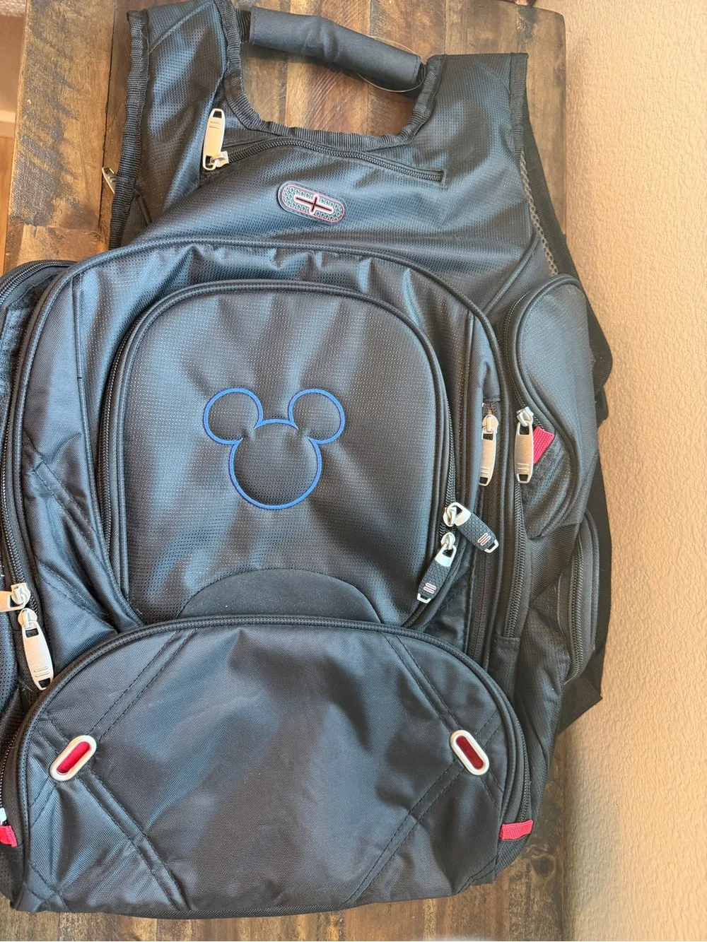 Disney Black Backpack with Blue Mickey Outline and Red Accents
